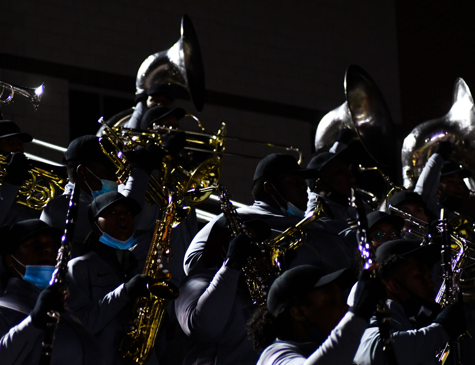 Lincoln University band students dance in the stands at the Capital City High School football game